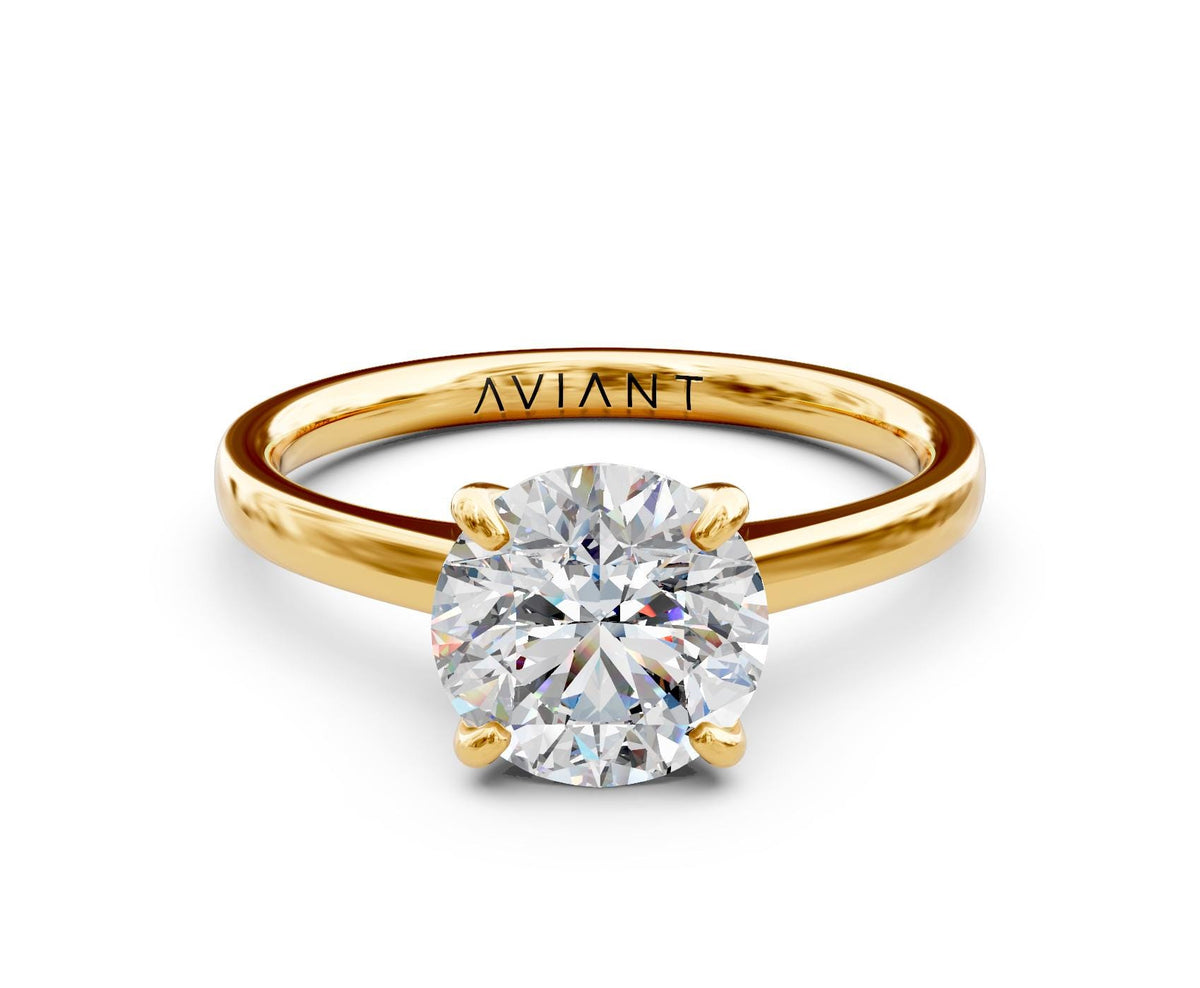 Ruby Solitaire engagement ring in 14k yellow gold