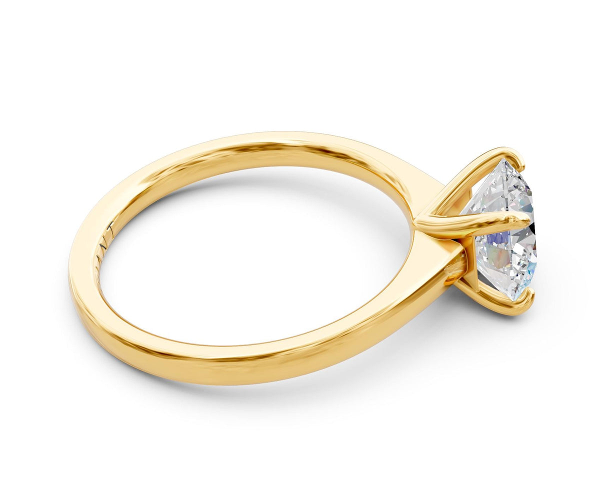 Ruby Solitaire engagement ring in 14k yellow gold