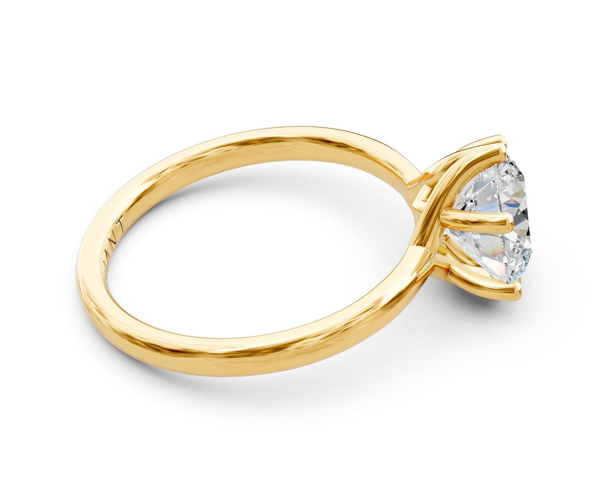 Clara Solitaire engagement ring in 14k yellow gold