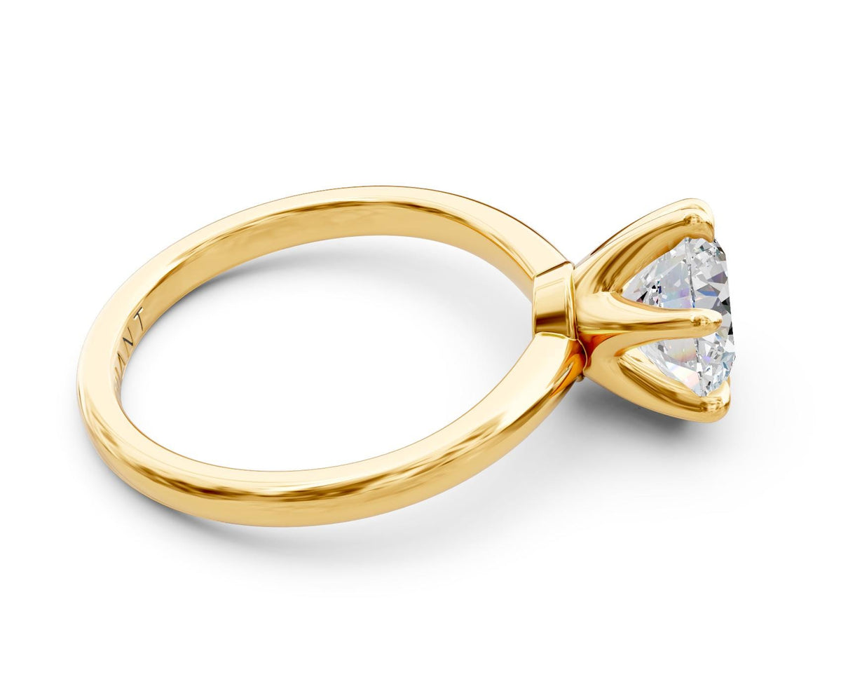 Esther Solitaire engagement ring in 14k yellow gold