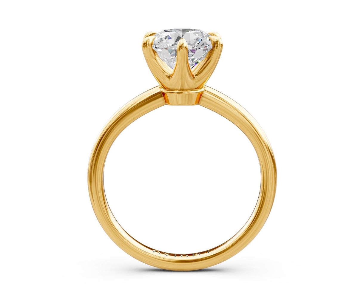 Esther Solitaire engagement ring in 14k yellow gold