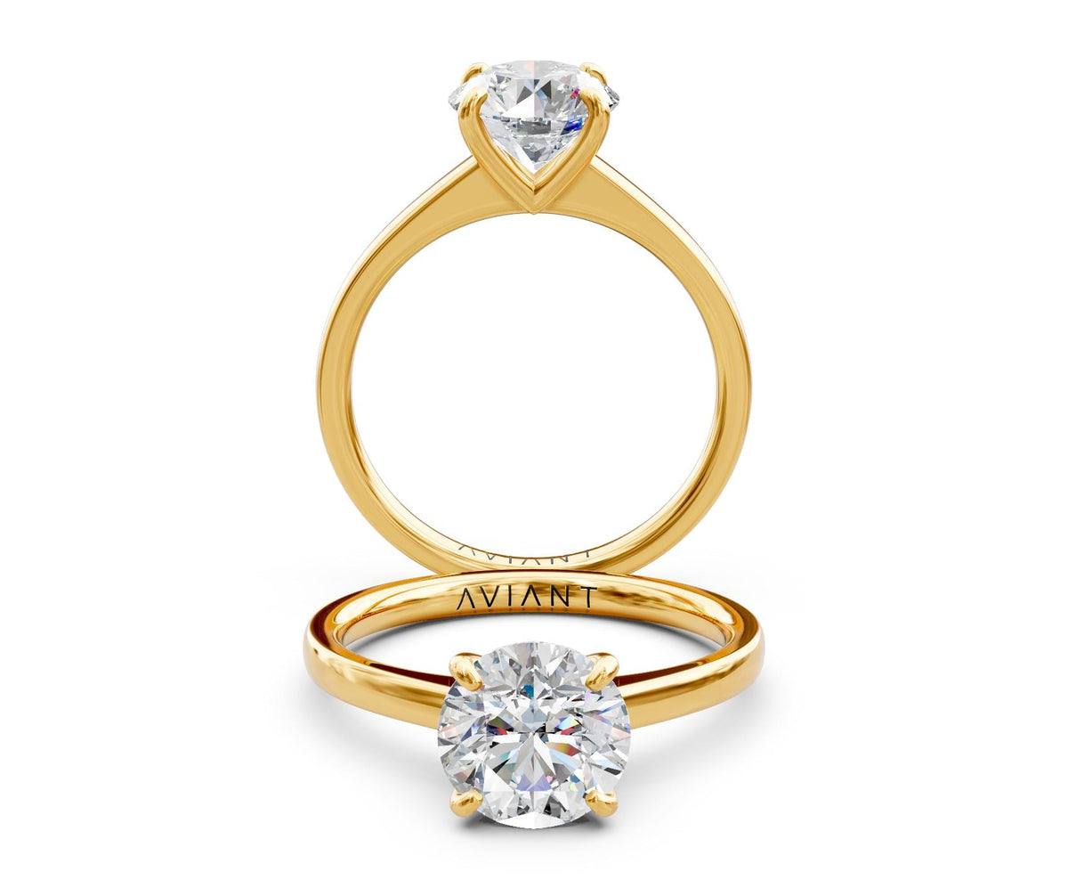 Ruby Solitaire engagement ring in 14k yellow gold